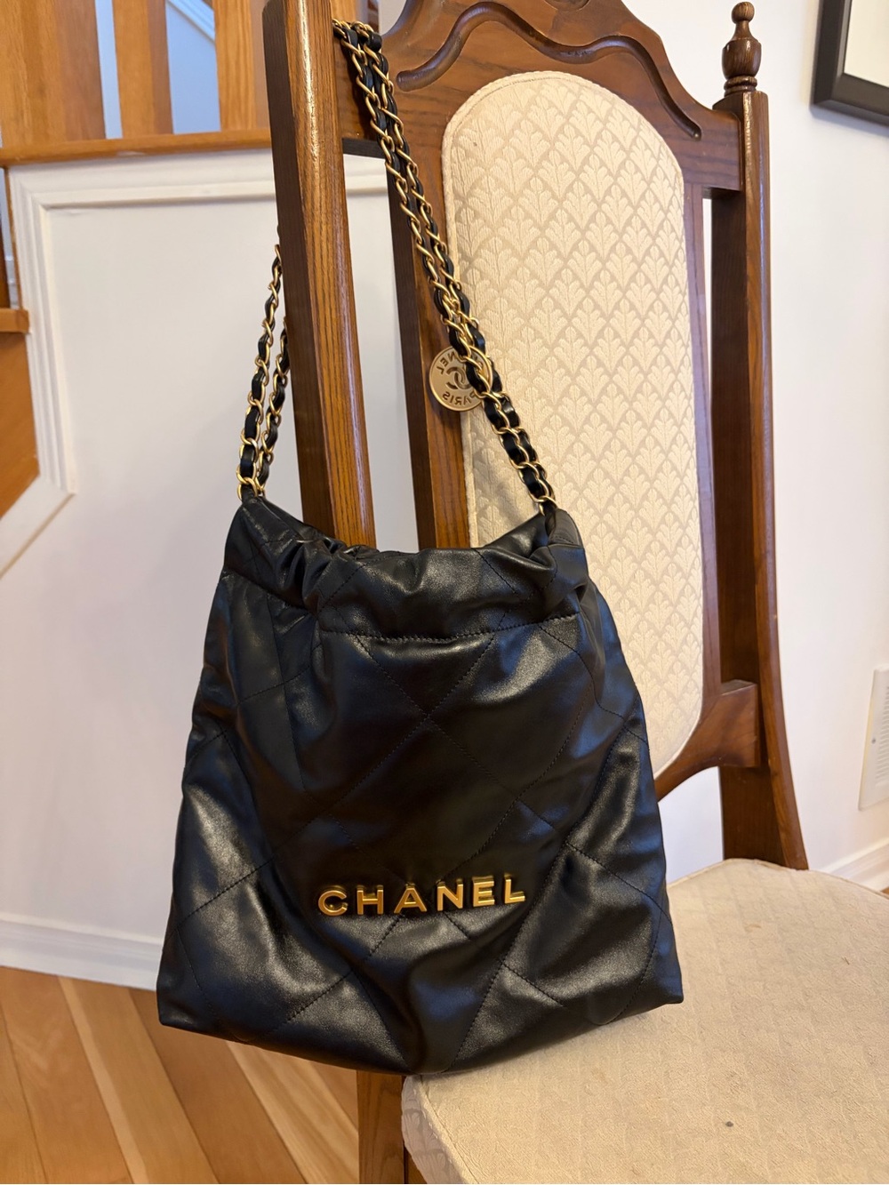 CHANEL Black Quilted Leather Shoulder Bag with Gold Logo